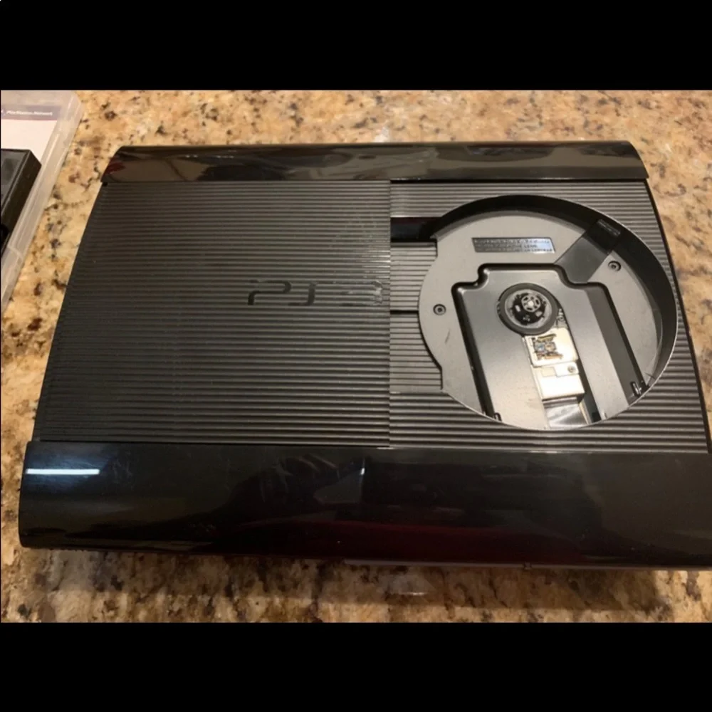 Sony PlayStation 3  Super Slim 250GB  Bundle, Model CECH 4001B + (7) Games